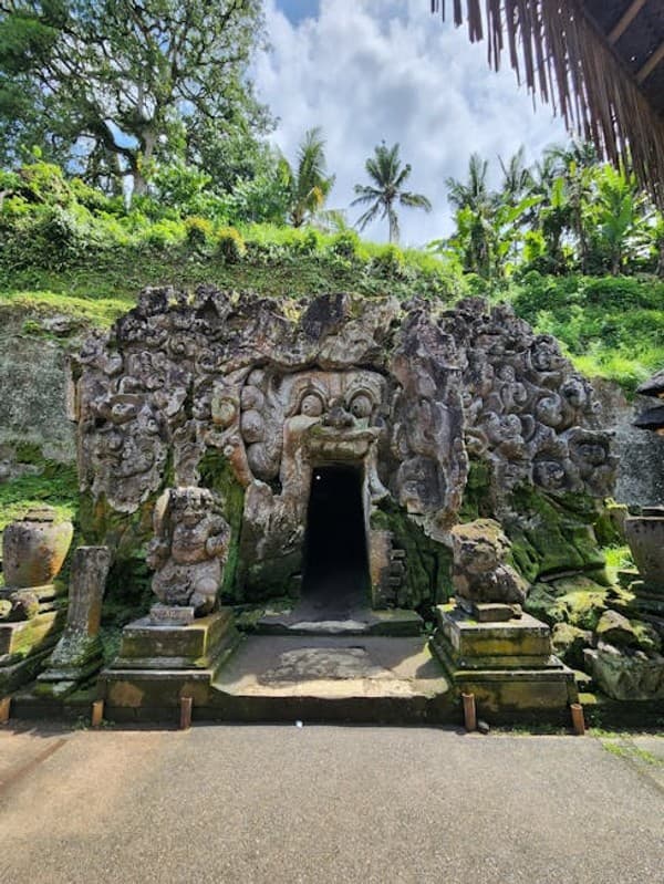 A captivating view of the ancient Elephant Cave entrance in Ubud, Bali, Indonesia.