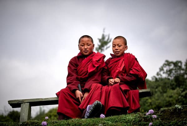 Bhutan: Two young monks attending the Gasa Tshechu.
