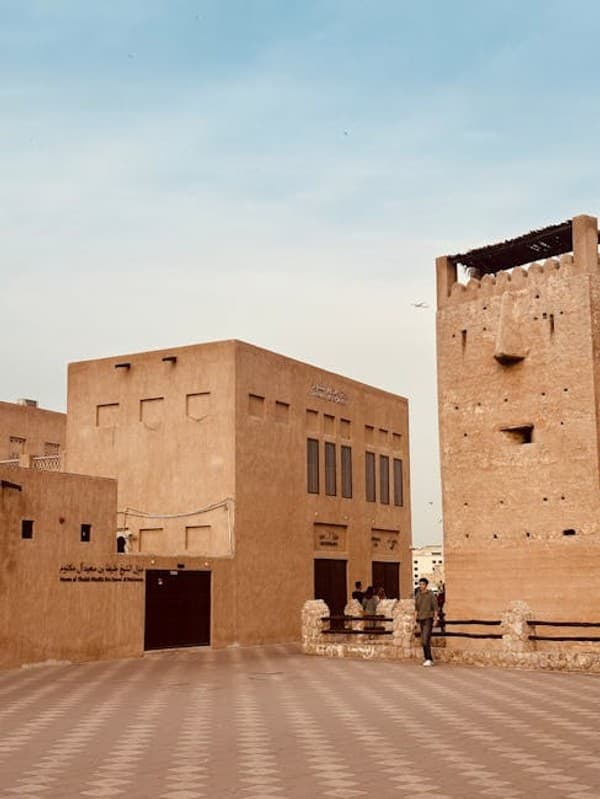 Explore traditional Emirati architecture in Dubai's historic Al Fahidi neighborhood.