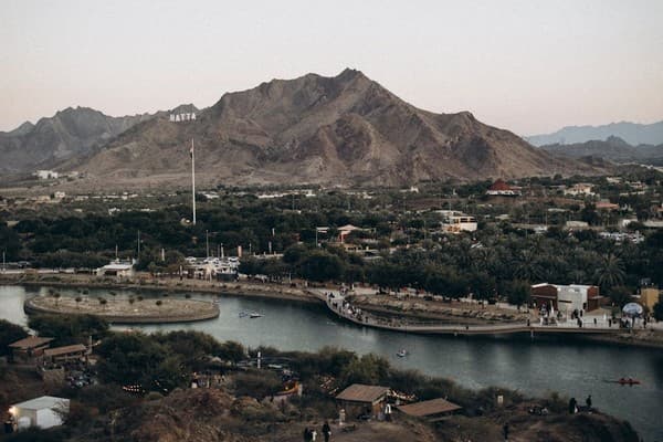 Explore the breathtaking landscape of Hatta Lake and mountains in Dubai, UAE.