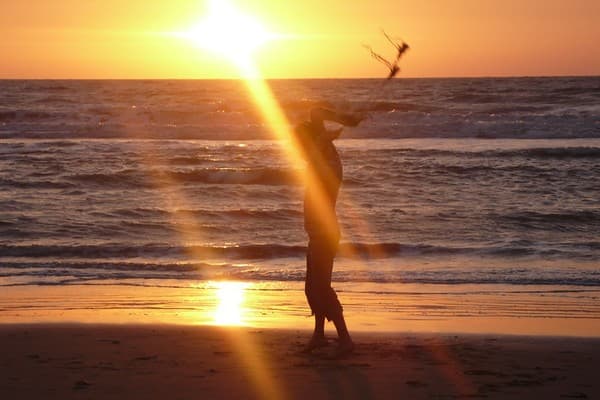 Sunrise yoga on the beach Photo 2