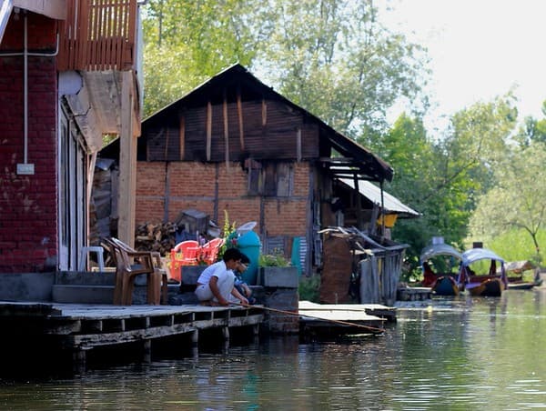 Trout fishing or trout meal by the river