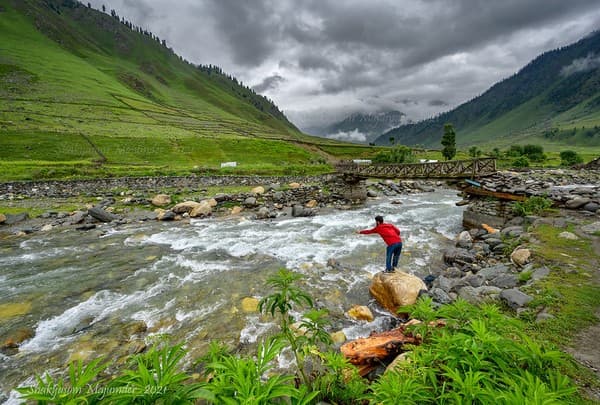 Trout fishing or trout meal by the river Photo 1
