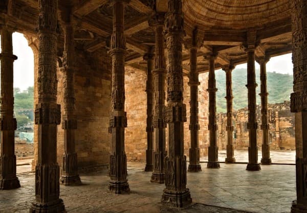 Beautifully detailed stone pillars in Ajmer, showcasing Islamic architecture.