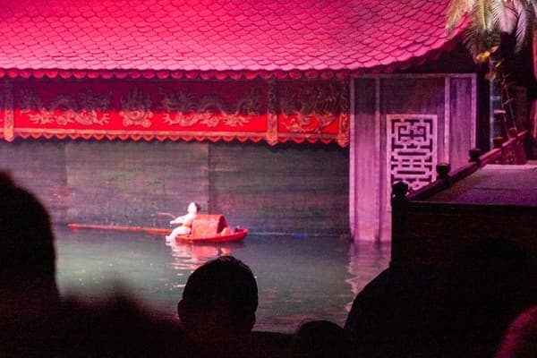 Watch a traditional water puppet show Photo 3