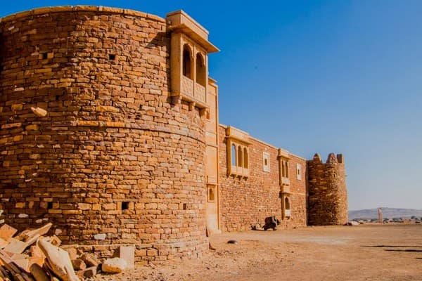 Capture of the ancient Khaba Fort amidst the arid landscapes of Jaisalmer, India. Capture of the ancient Khaba Fort amidst the arid landscapes of Jaisalmer, India.