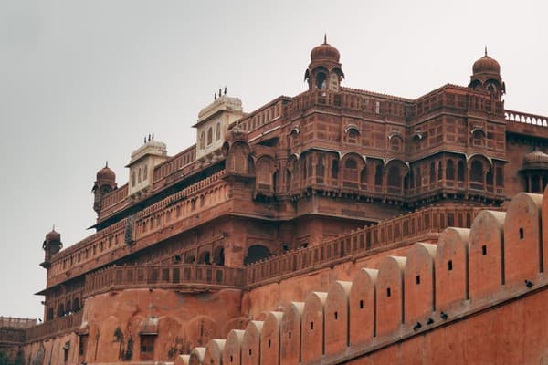 Stunning view of Junagarh Fort showcasing its intricate Rajput architecture in Bikaner, India. Stunning view of Junagarh Fort showcasing its intricate Rajput architecture in Bikaner, India.