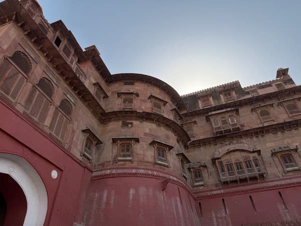 A sunlit view of the majestic Bikaner Fort showcasing its classic Rajasthani architecture. A sunlit view of the majestic Bikaner Fort showcasing its classic Rajasthani architecture.